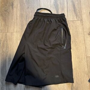 Black Legend athletic dry fit shorts with zipper pockets